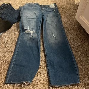 Women’s jeans. Worn once. Little flare/ straight.